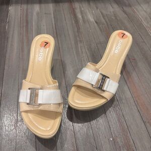 Bebe Cream and White Mules with Metallic Accent